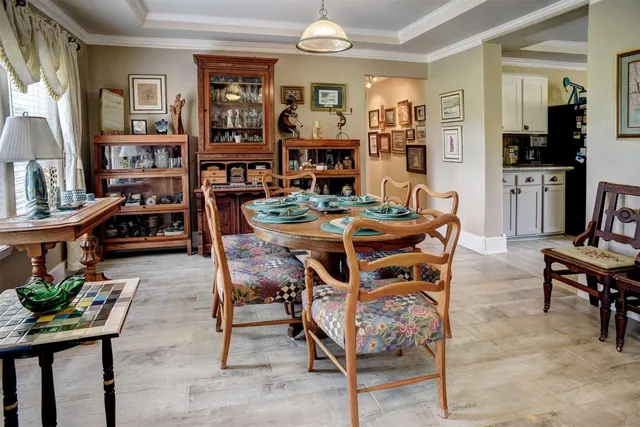 a view of a dining room with furniture