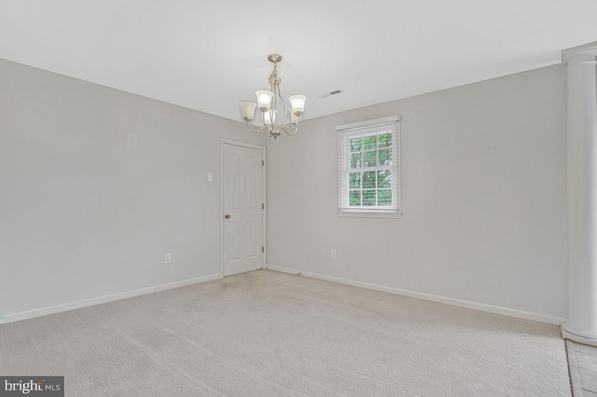 1420 Knight Avenue Dunkirk, MD 20754 - Photo 14 of 30 wooden floor in an empty room with a window