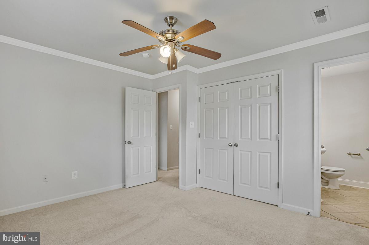 1420 Knight Avenue Dunkirk, MD 20754 - Photo 15 of 30 a view of a livingroom with a chandelier fan