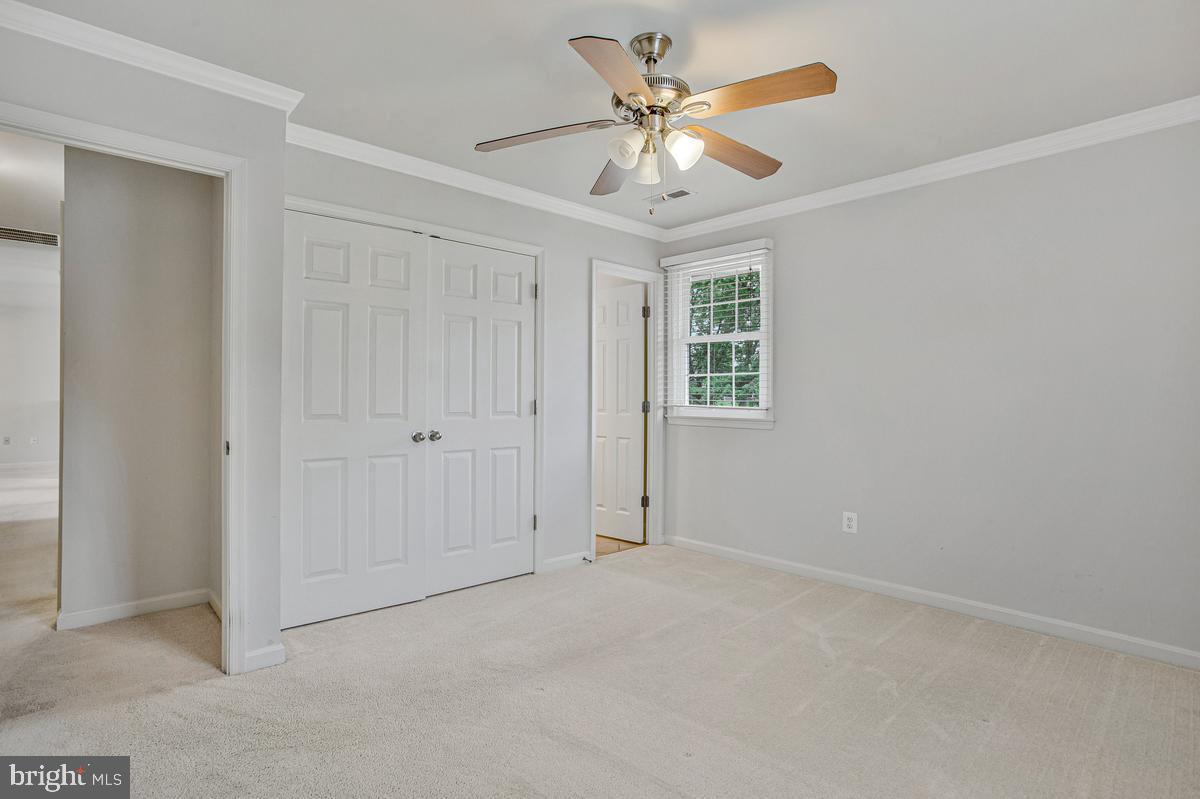 1420 Knight Avenue Dunkirk, MD 20754 - Photo 21 of 30 an empty room with windows and fan