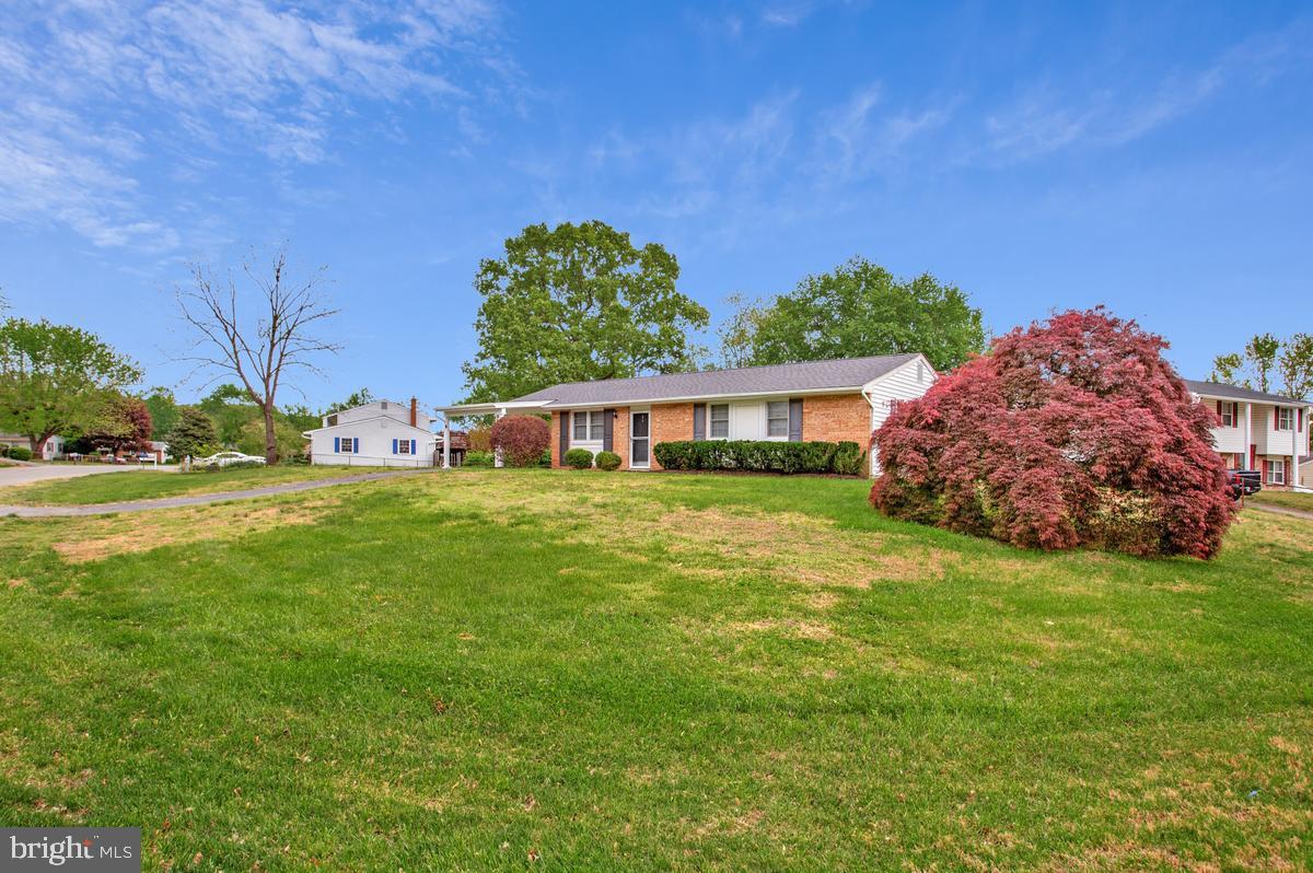 1420 Knight Avenue Dunkirk, MD 20754 - Photo 25 of 30 a front view of a house with garden