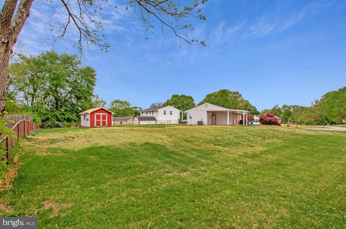 1420 Knight Avenue Dunkirk, MD 20754 - Photo 27 of 30 a front view of a house with garden