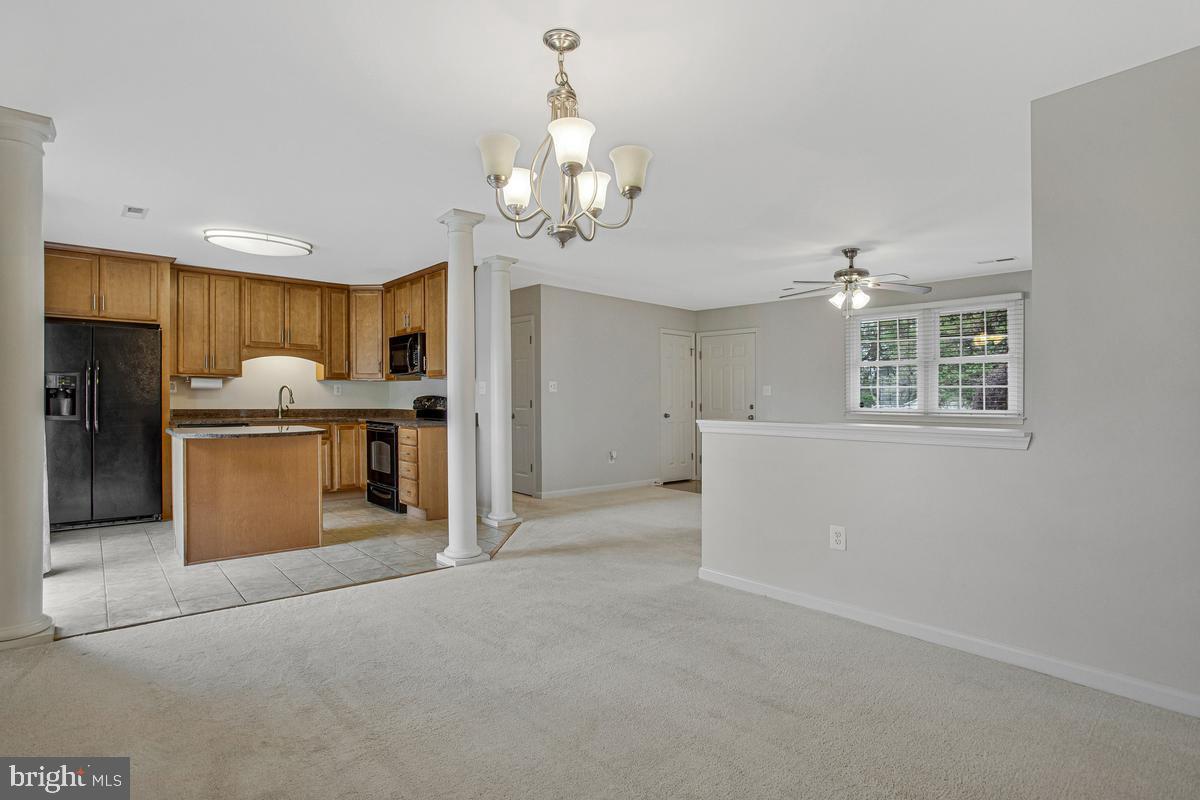 1420 Knight Avenue Dunkirk, MD 20754 - Photo 3 of 30 a view of a kitchen with a sink and a refrigerator
