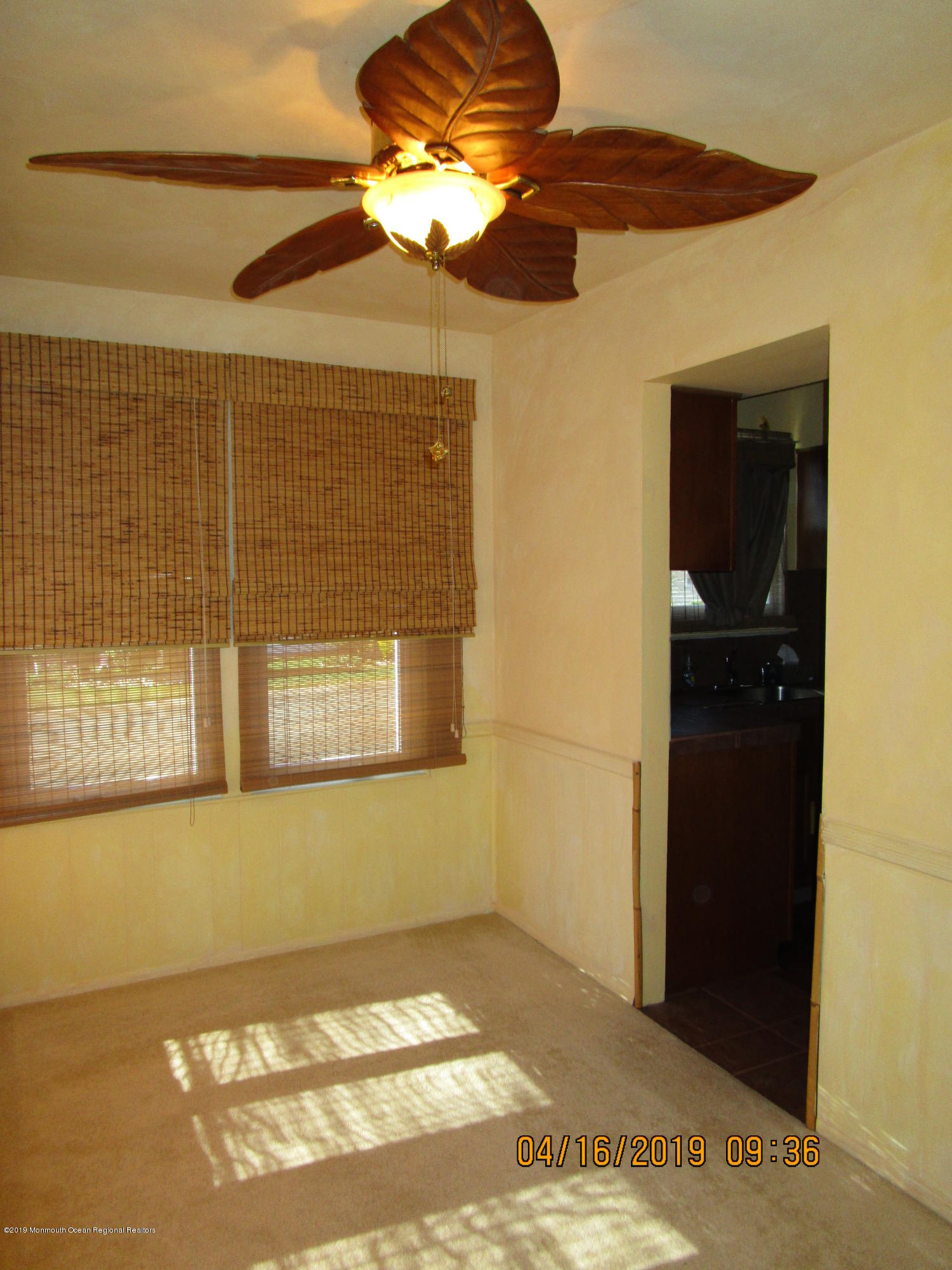 64 A Sunset Road Whiting, NJ 08759 - Photo 8 of 18 a view of an empty room with a window