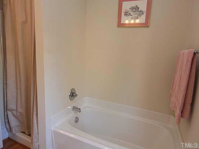 103 Georgetown Road Raleigh, NC 27608 - Photo 7 of 12 Master bath with dual vanity also has tub and separate shower Master Bath/Spa