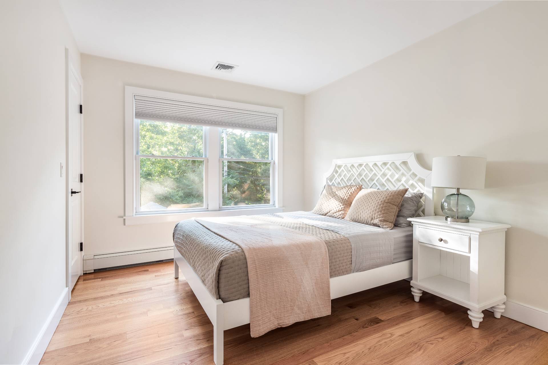 27 Kings Point Road East Hampton, NY 11937 - Photo 13 of 17 a bedroom with a bed and a large window