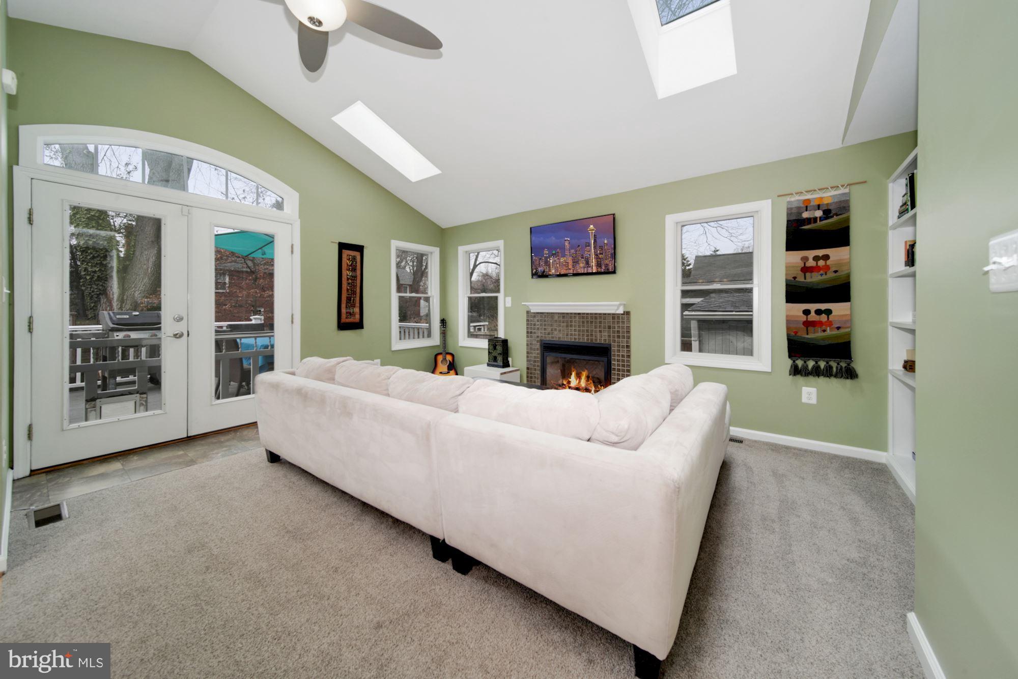 9130 Bradford Road Silver Spring, MD 20901 - Photo 7 of 34 Cozy up by the fireplace