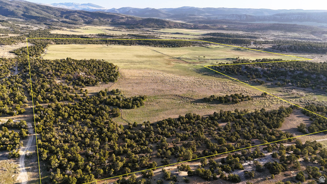 123 Tbd Forest Service Rd 640a (s Salina, UT 84654 - Photo 3 of 69 Aerial view of sparsely populated area with property boundaries highlighted and a mountain backdrop