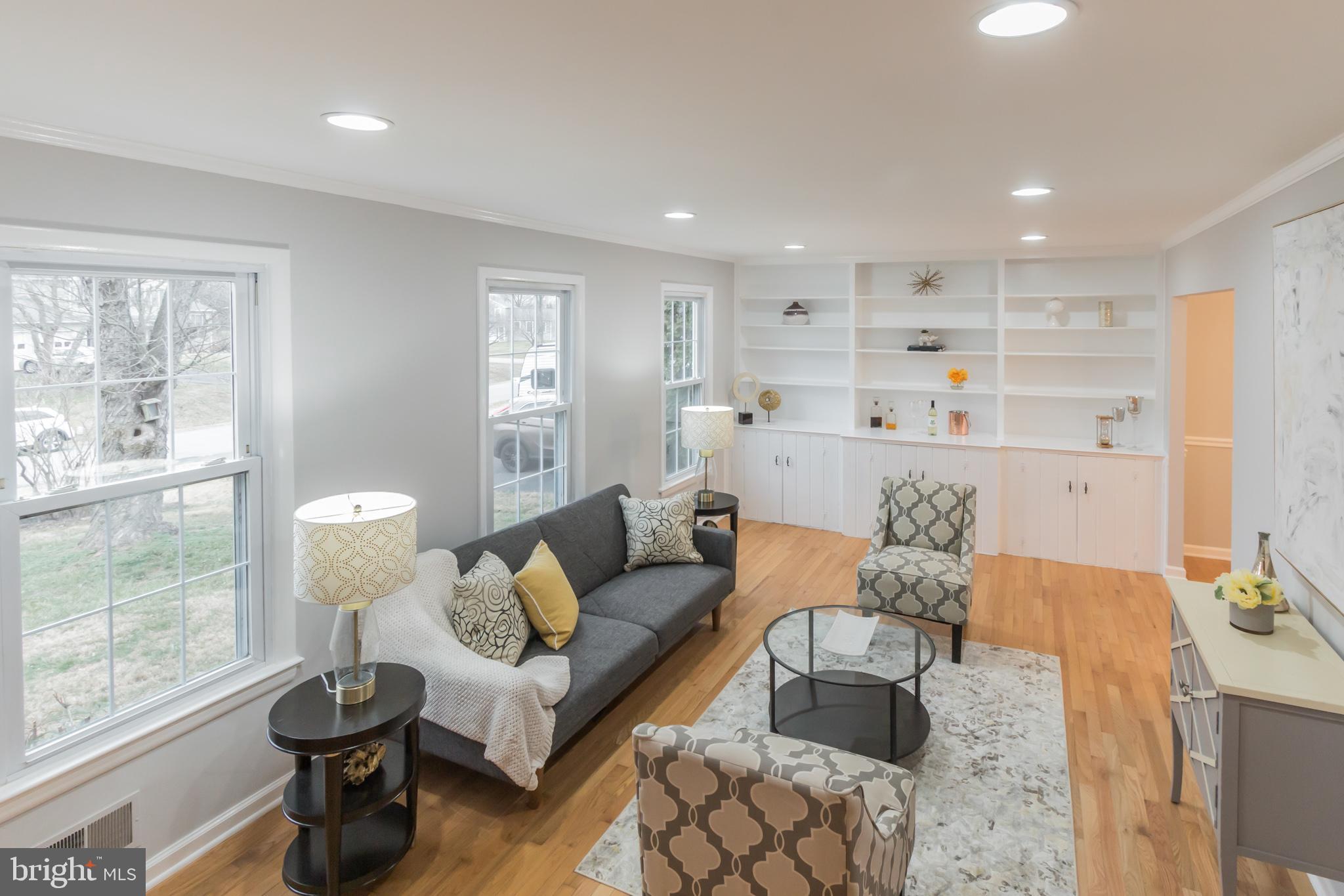 17120 Whites Road Poolesville, MD 20837 - Photo 26 of 30 a living room with furniture and a large window