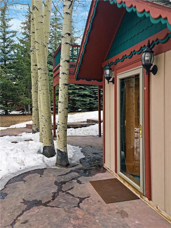778 Deer Path Road Dillon, CO 80435 - Photo 2 of 17 a front view of a house with a porch