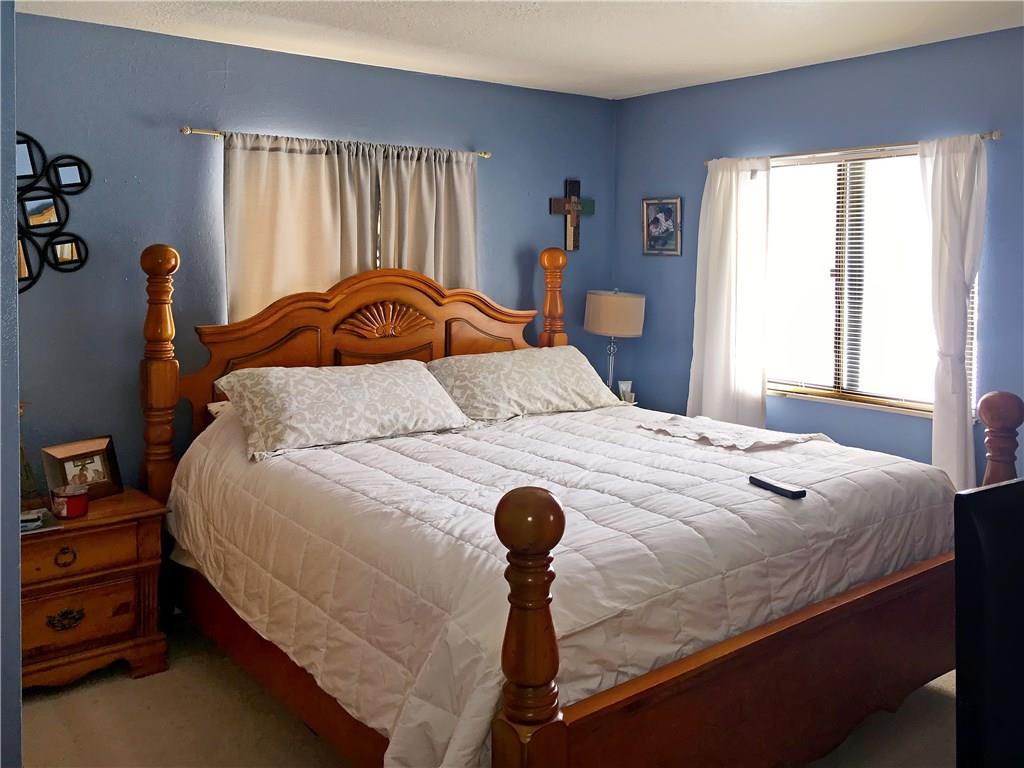 778 Deer Path Road Dillon, CO 80435 - Photo 14 of 17 a bedroom with a bed and a window
