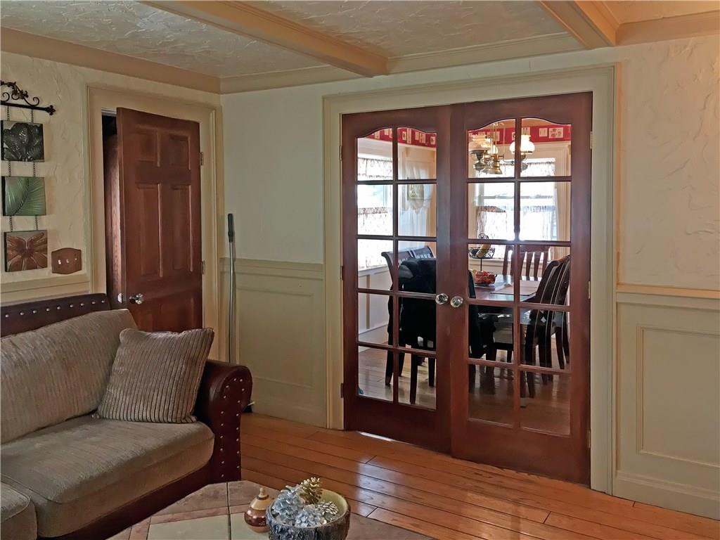 778 Deer Path Road Dillon, CO 80435 - Photo 8 of 17 a living room with furniture and a dining table with wooden floor