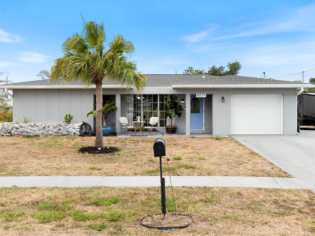 6531 Marius Road North Port, FL 34287 - Photo 1 of 1 a swimming pool with outdoor seating