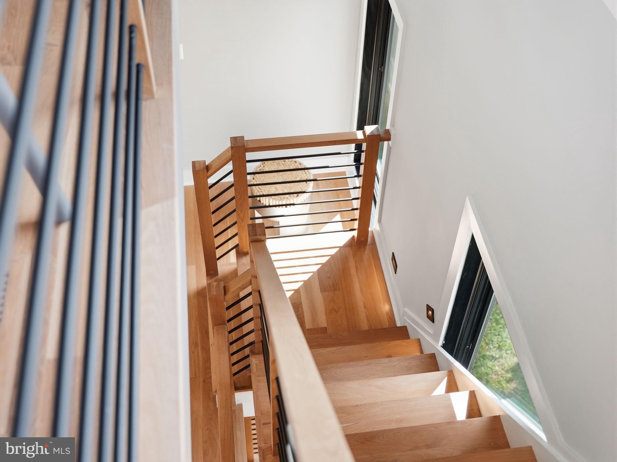 2211 Military Road Arlington, VA 22207 - Photo 92 of 107 Elegant staircase with natural light.