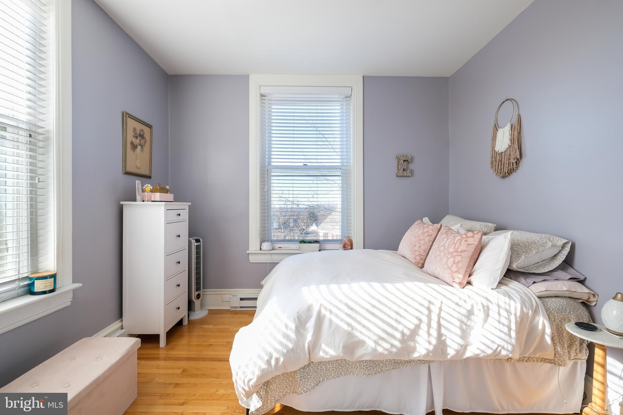 22 North Main Street, Unit 1 Doylestown, PA 18901 - Photo 13 of 22 a bedroom with a bed and a window