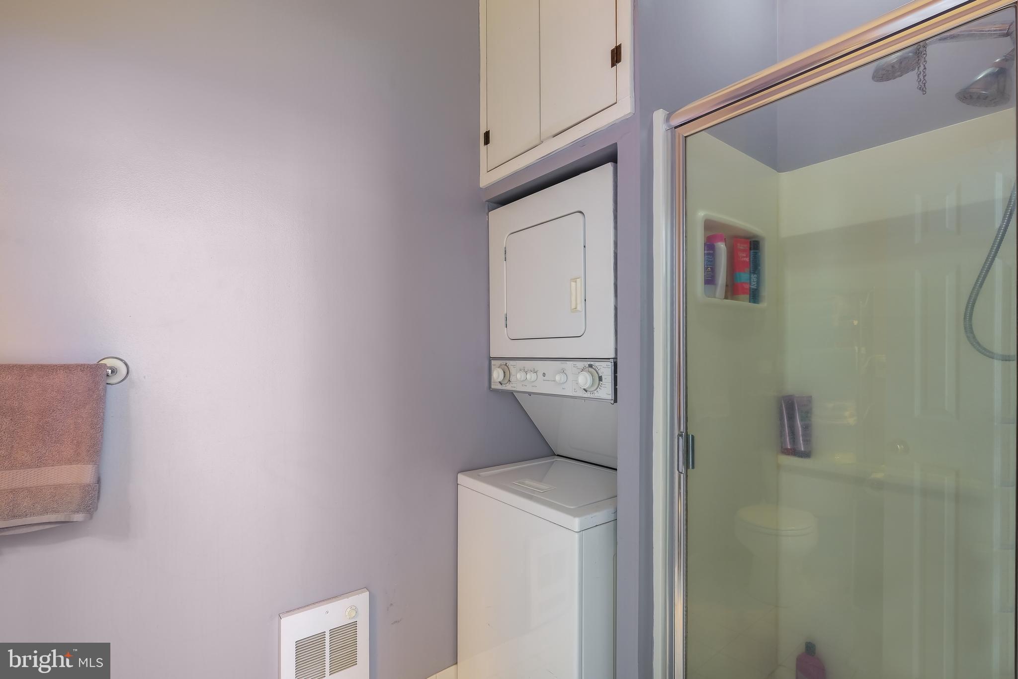 22 North Main Street, Unit 1 Doylestown, PA 18901 - Photo 14 of 22 a utility room with dryer and washer