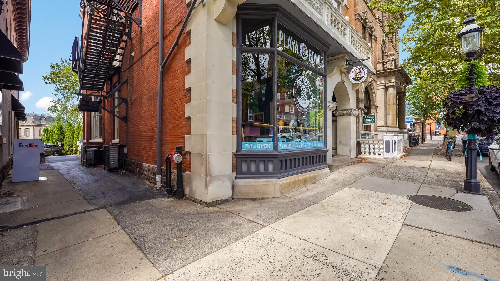 22 North Main Street, Unit 1 Doylestown, PA 18901 - Photo 3 of 22 a view of a pathway along the building