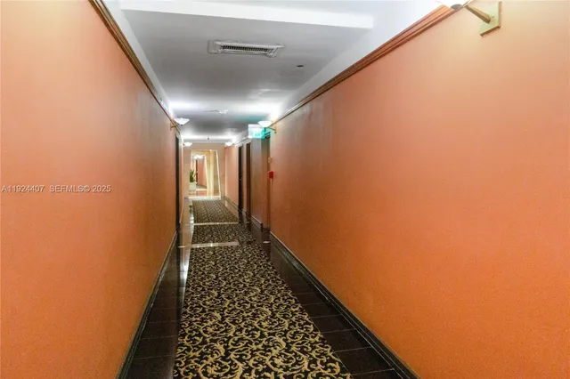 a view of hallway with stairs