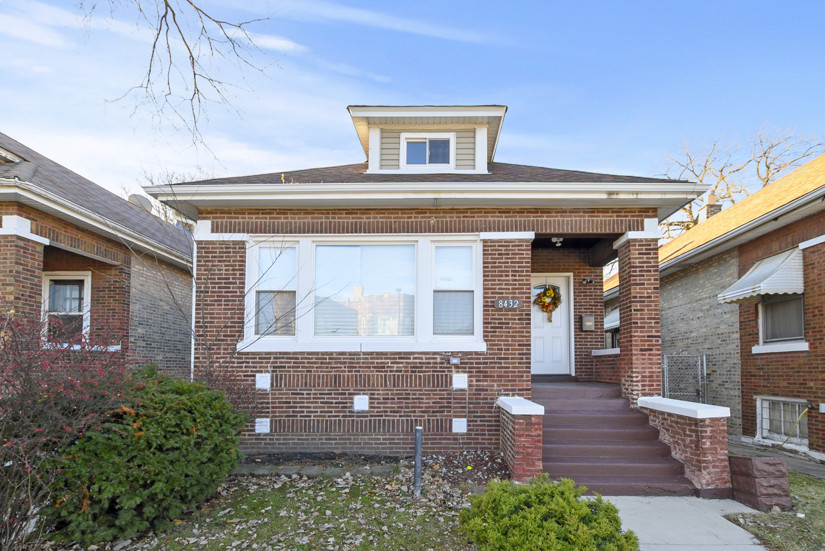 8432 South Green Street Chicago, IL 60620 - Photo 1 of 1 a front view of a house with garden