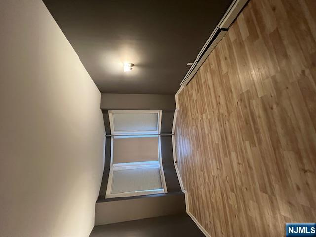 108 Chester Avenue Newark, NJ 07104 - Photo 3 of 7 a view of empty room with wooden floor