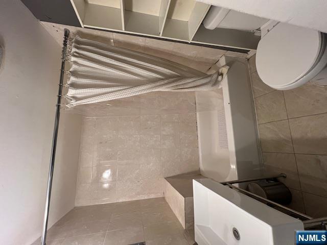 108 Chester Avenue Newark, NJ 07104 - Photo 6 of 7 a bathroom with a sink and a vanity