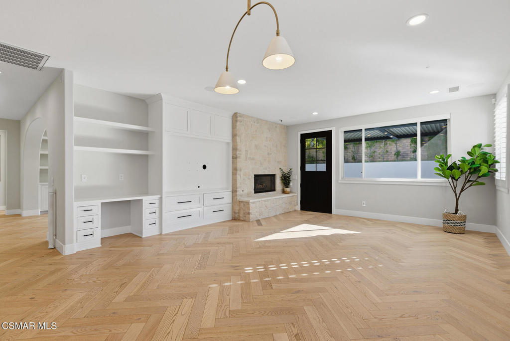 4630 Rio Bravo Court Moorpark, CA 93021 - Photo 12 of 43 a view of a kitchen with furniture and a potted plant