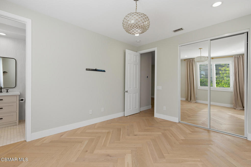 4630 Rio Bravo Court Moorpark, CA 93021 - Photo 32 of 43 a view of an empty room with a chandelier