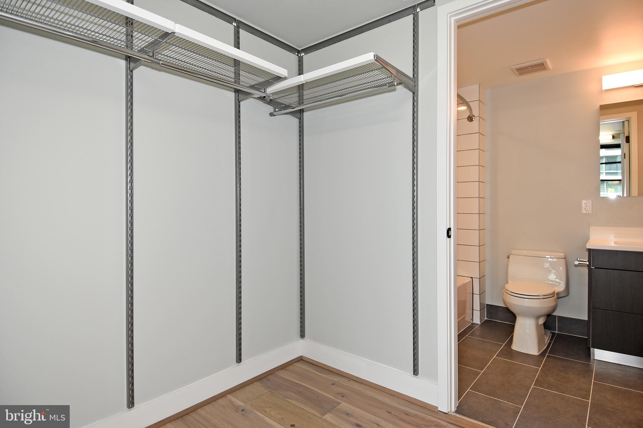 1300 4th Street Southeast, Unit 413 Washington, DC 20003 - Photo 18 of 47 a bathroom with a toilet and a shower