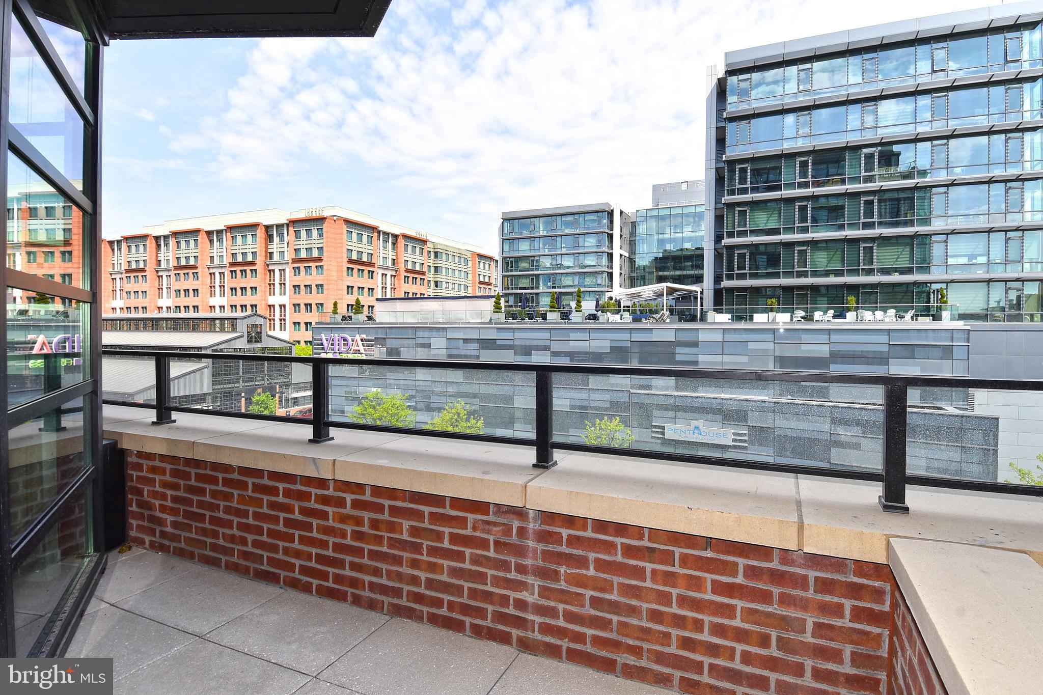 1300 4th Street Southeast, Unit 413 Washington, DC 20003 - Photo 27 of 47 a view of building with yard