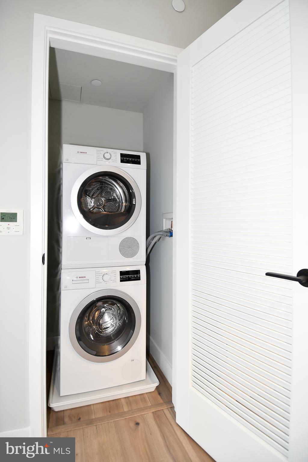 1300 4th Street Southeast, Unit 413 Washington, DC 20003 - Photo 30 of 47 a utility room with dryer and washer