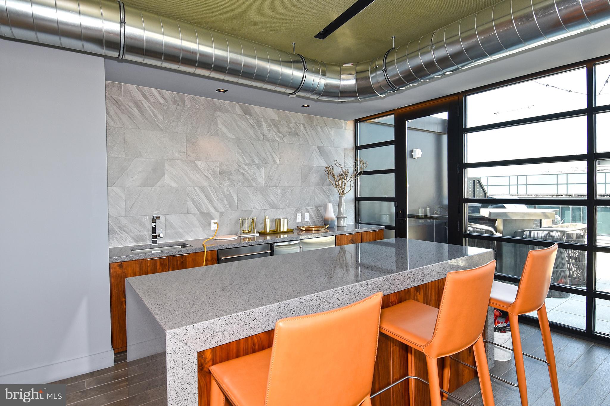 1300 4th Street Southeast, Unit 413 Washington, DC 20003 - Photo 35 of 47 a dining table with chairs and window