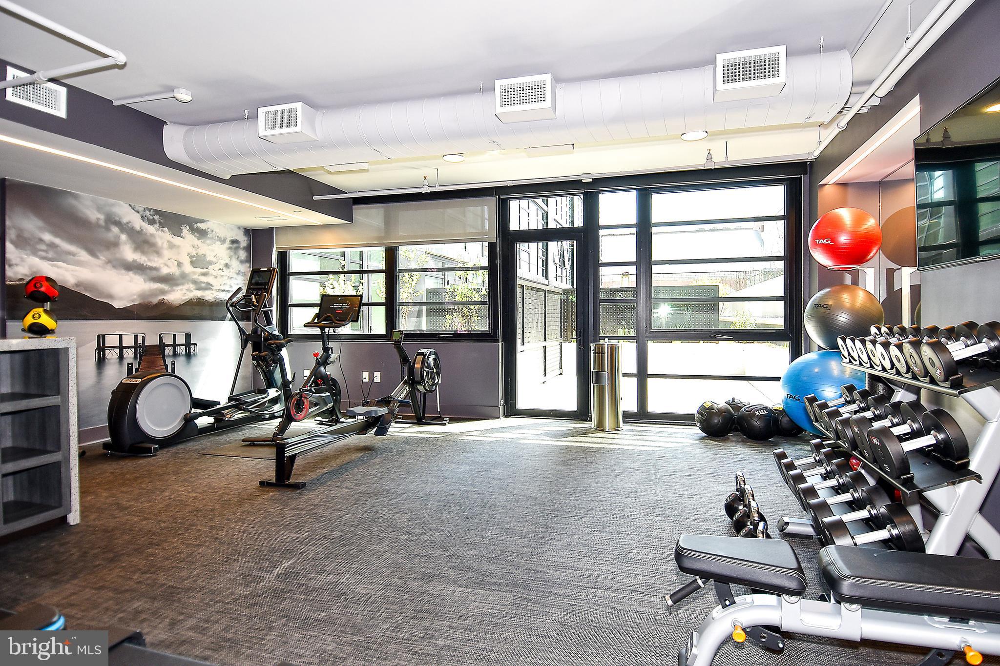 1300 4th Street Southeast, Unit 413 Washington, DC 20003 - Photo 40 of 47 a view of a room with gym equipment