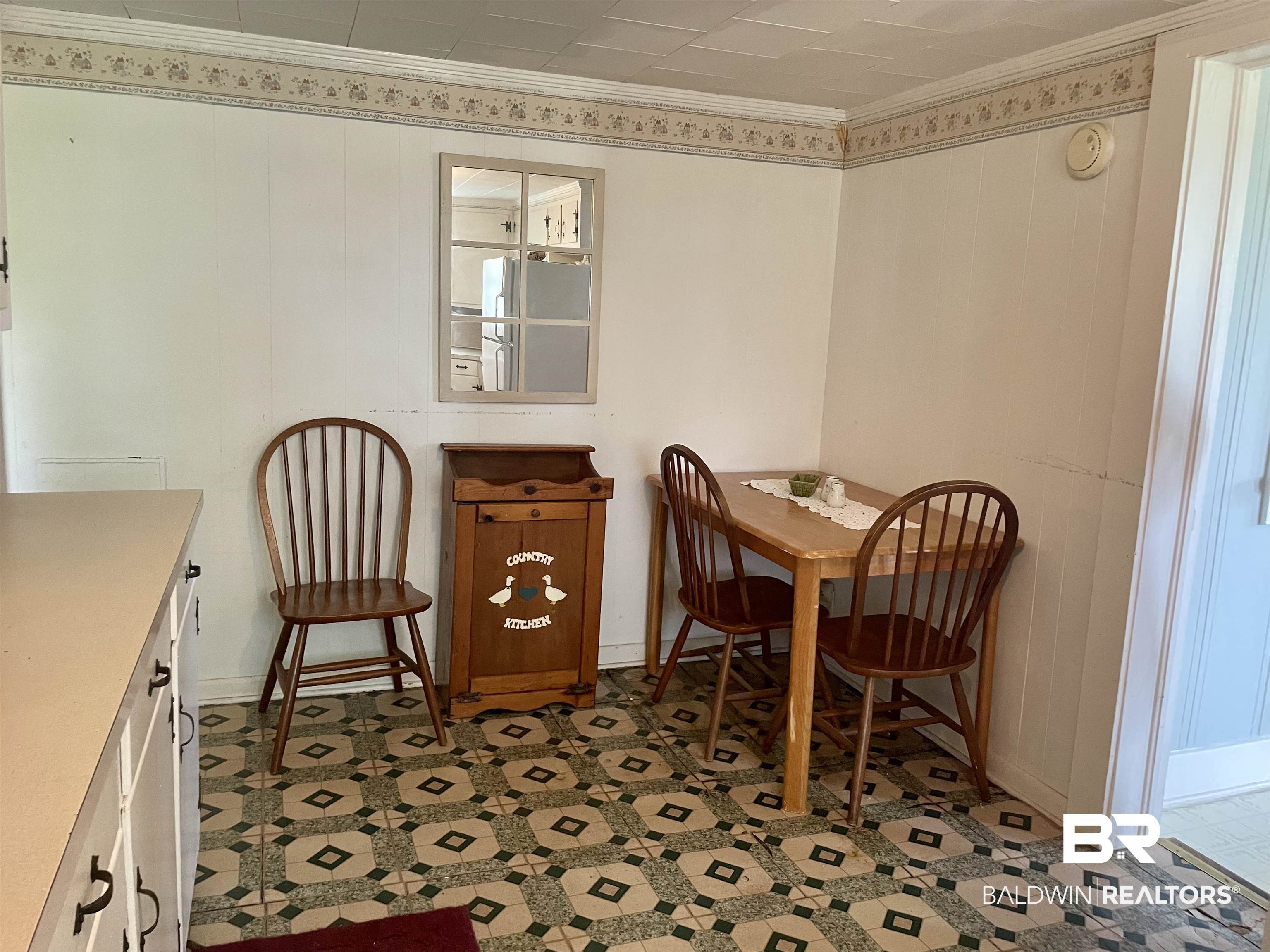 10673 Jack Springs Road Atmore, AL 36502 - Photo 7 of 14 Dining space with ornamental molding