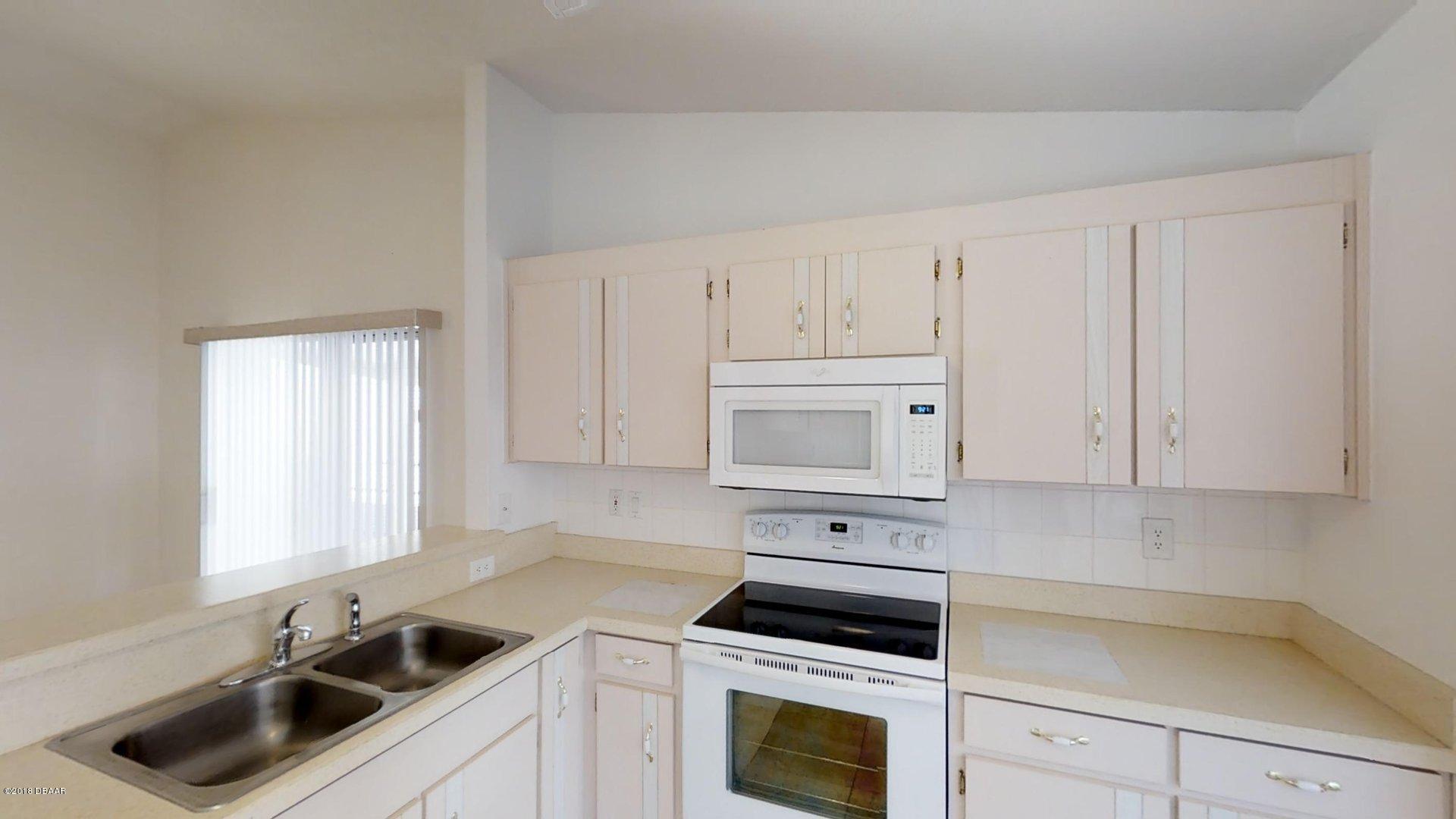 1034 Deer Springs Road Port Orange, FL 32129 - Photo 4 of 21 Kitchen
