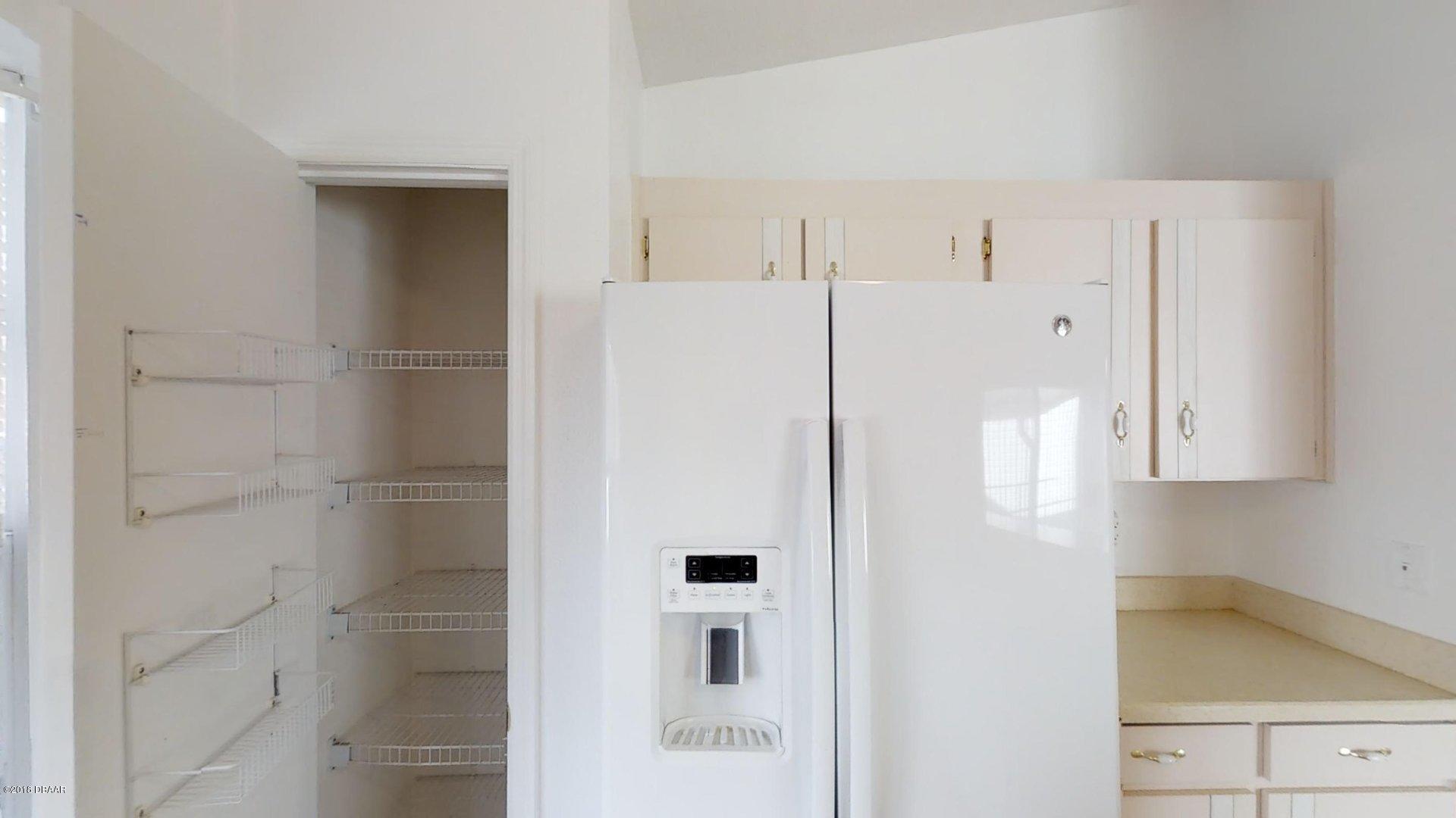 1034 Deer Springs Road Port Orange, FL 32129 - Photo 5 of 21 Kitchen/Pantry