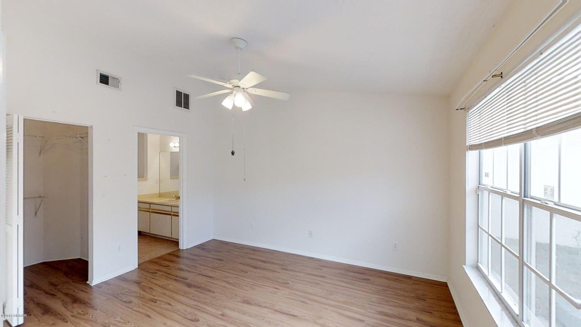 1034 Deer Springs Road Port Orange, FL 32129 - Photo 7 of 21 Master Bedroom