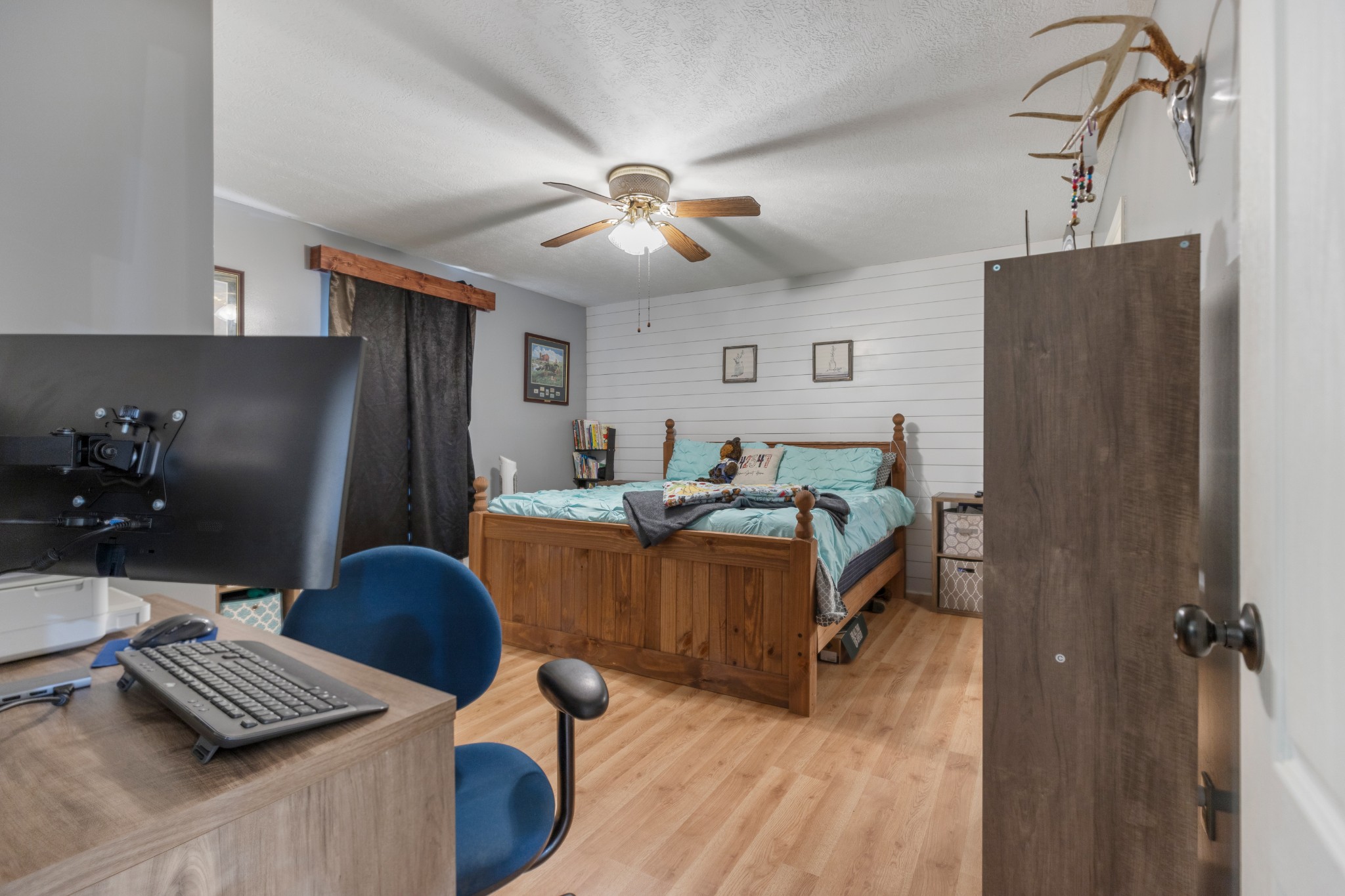 125 Oak Crest Drive Tennessee Ridge, TN 37178 - Photo 17 of 31 a bedroom with furniture and a window