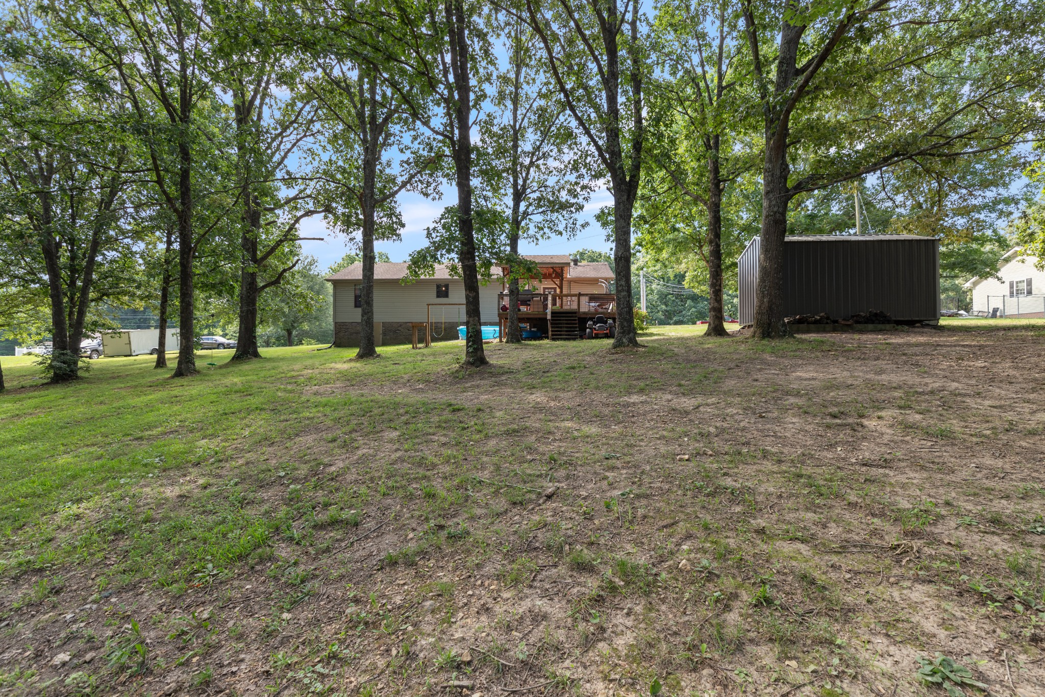 125 Oak Crest Drive Tennessee Ridge, TN 37178 - Photo 28 of 31 a view of a house with a yard