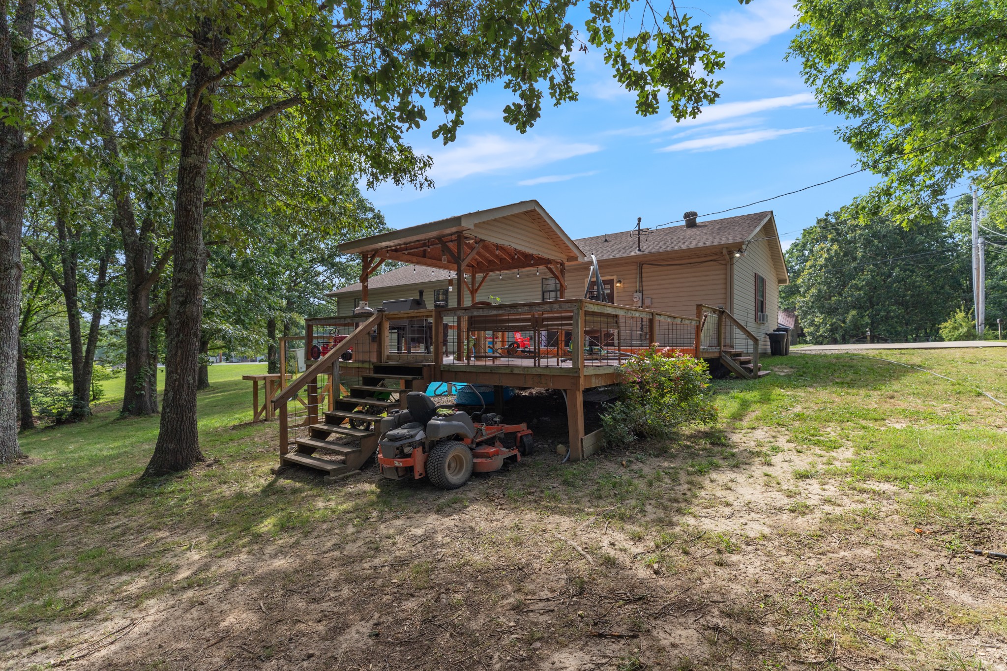 125 Oak Crest Drive Tennessee Ridge, TN 37178 - Photo 30 of 31 a view of a house with a yard porch and sitting area