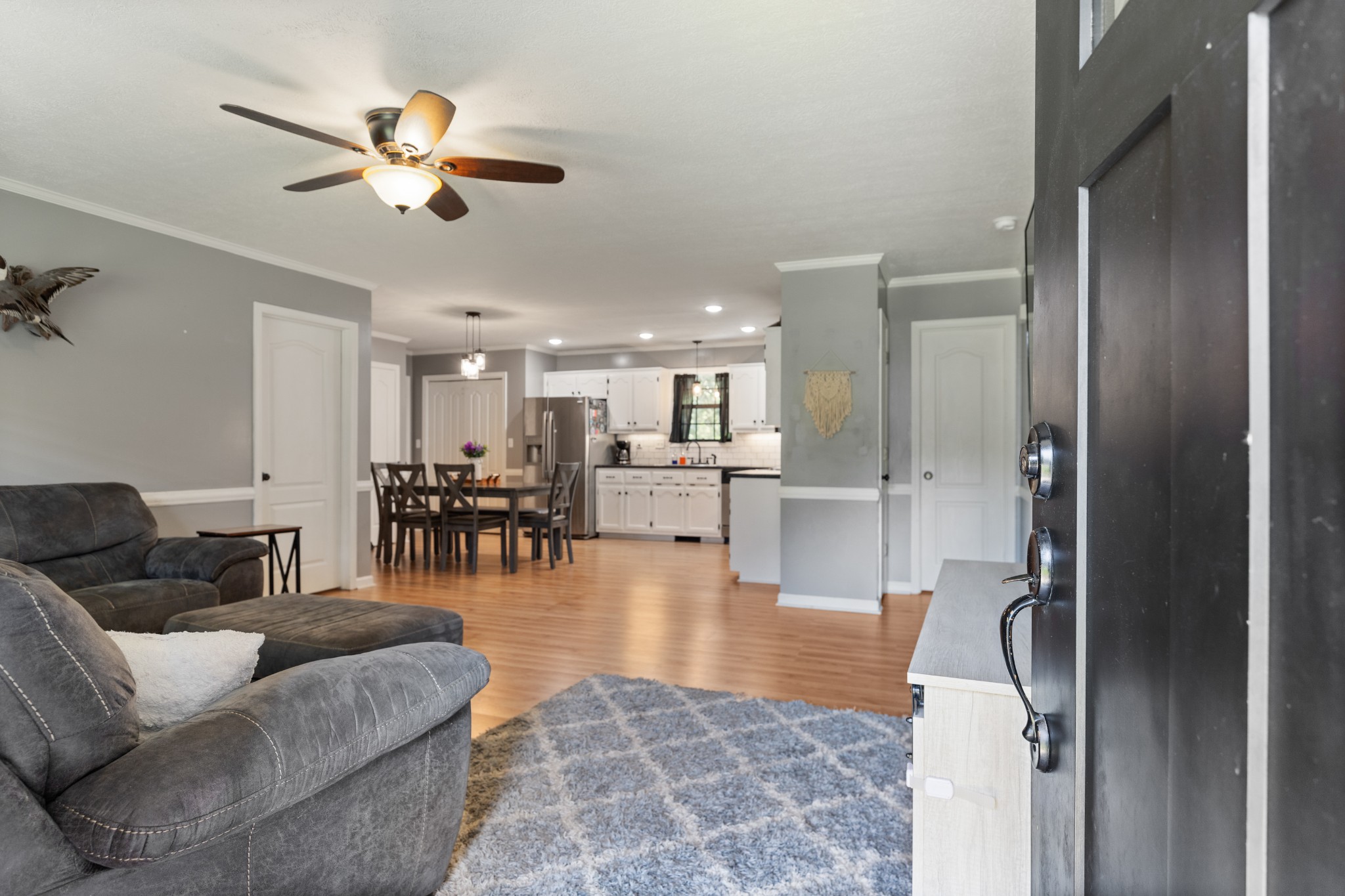 125 Oak Crest Drive Tennessee Ridge, TN 37178 - Photo 4 of 31 a living room with furniture and a view of kitchen