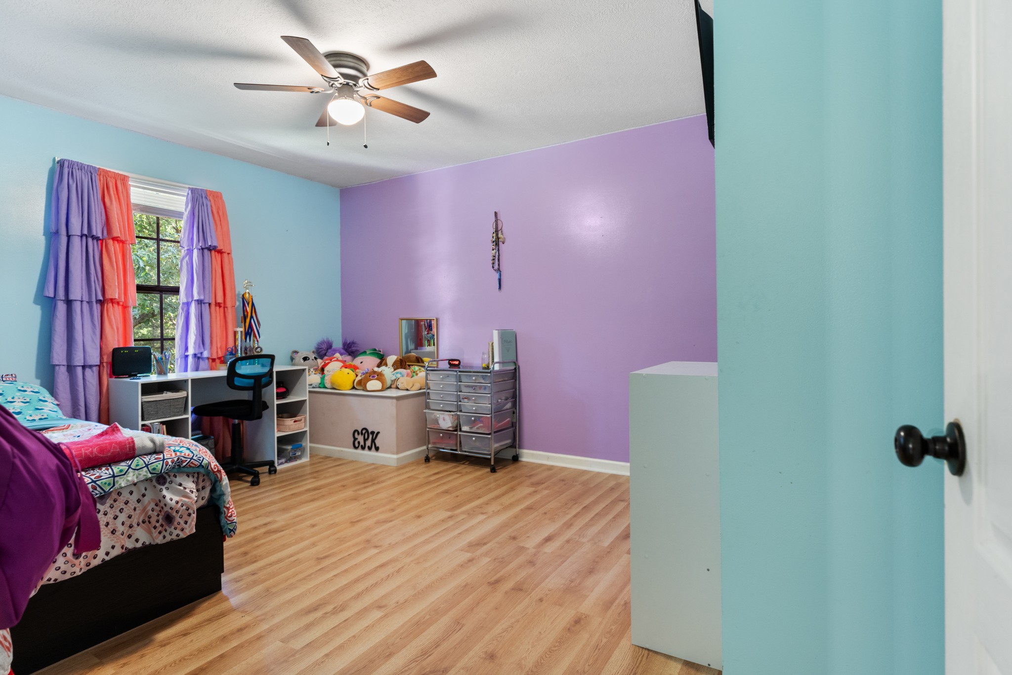 125 Oak Crest Drive Tennessee Ridge, TN 37178 - Photo 8 of 31 a bedroom with furniture and a chandelier