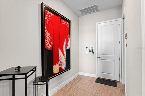 a outdoor space with patio area and glass door