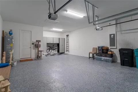 a front view of a house with a lake view