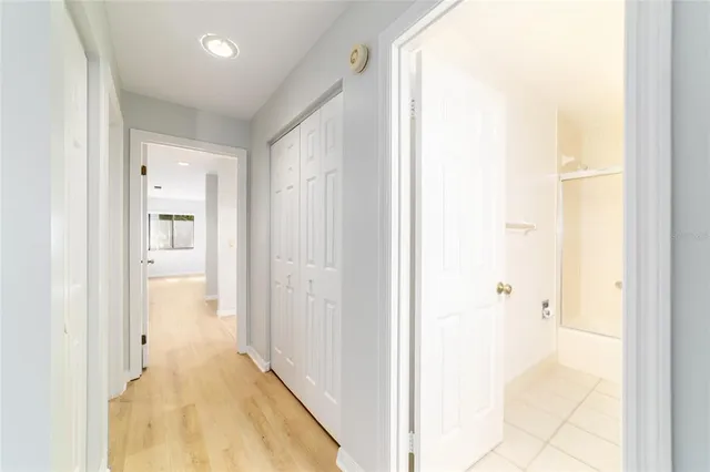 a view of a bedroom from a hallway