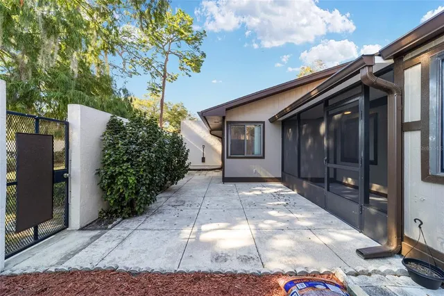 a backyard of a house with lots of green space