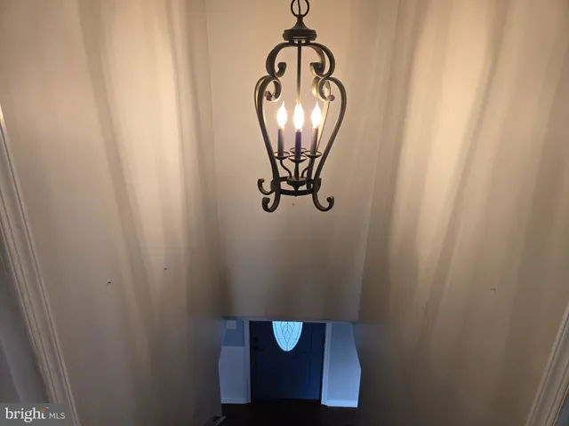 a view of staircase with mirror