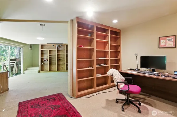 a view of a livingroom with furniture and a rug