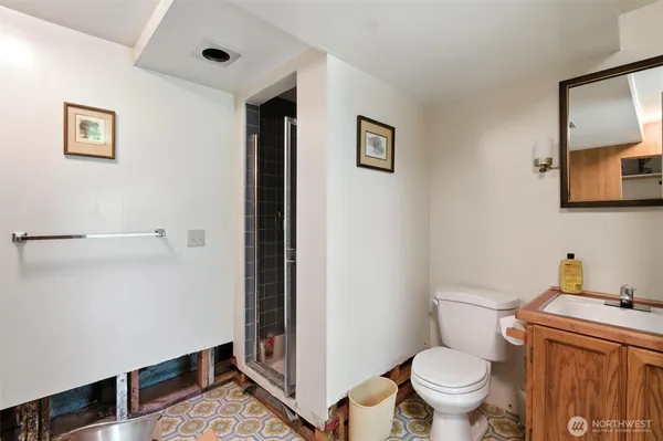 a kitchen with stainless steel appliances granite countertop a sink and a stove