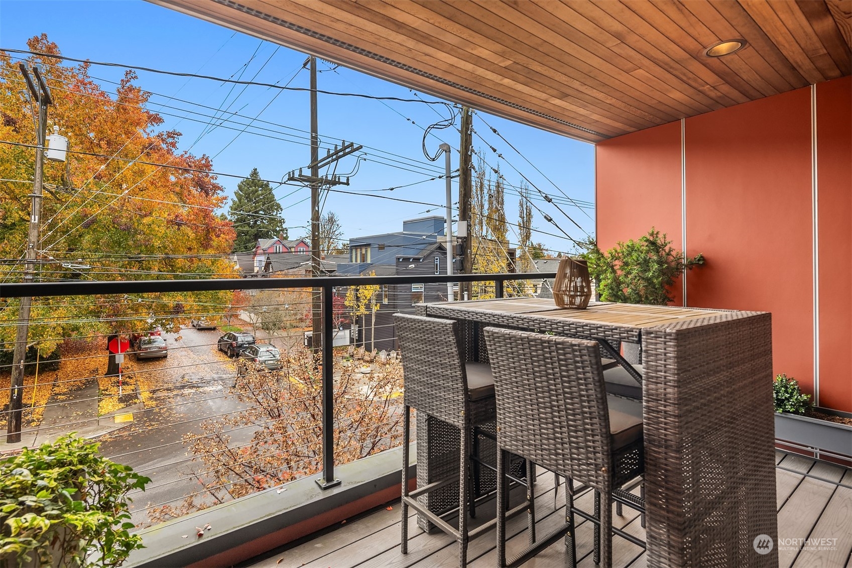 315 West Galer Street, Unit 101 Seattle, WA 98119 - Photo 11 of 37 a view of balcony with wooden floor and outdoor seating