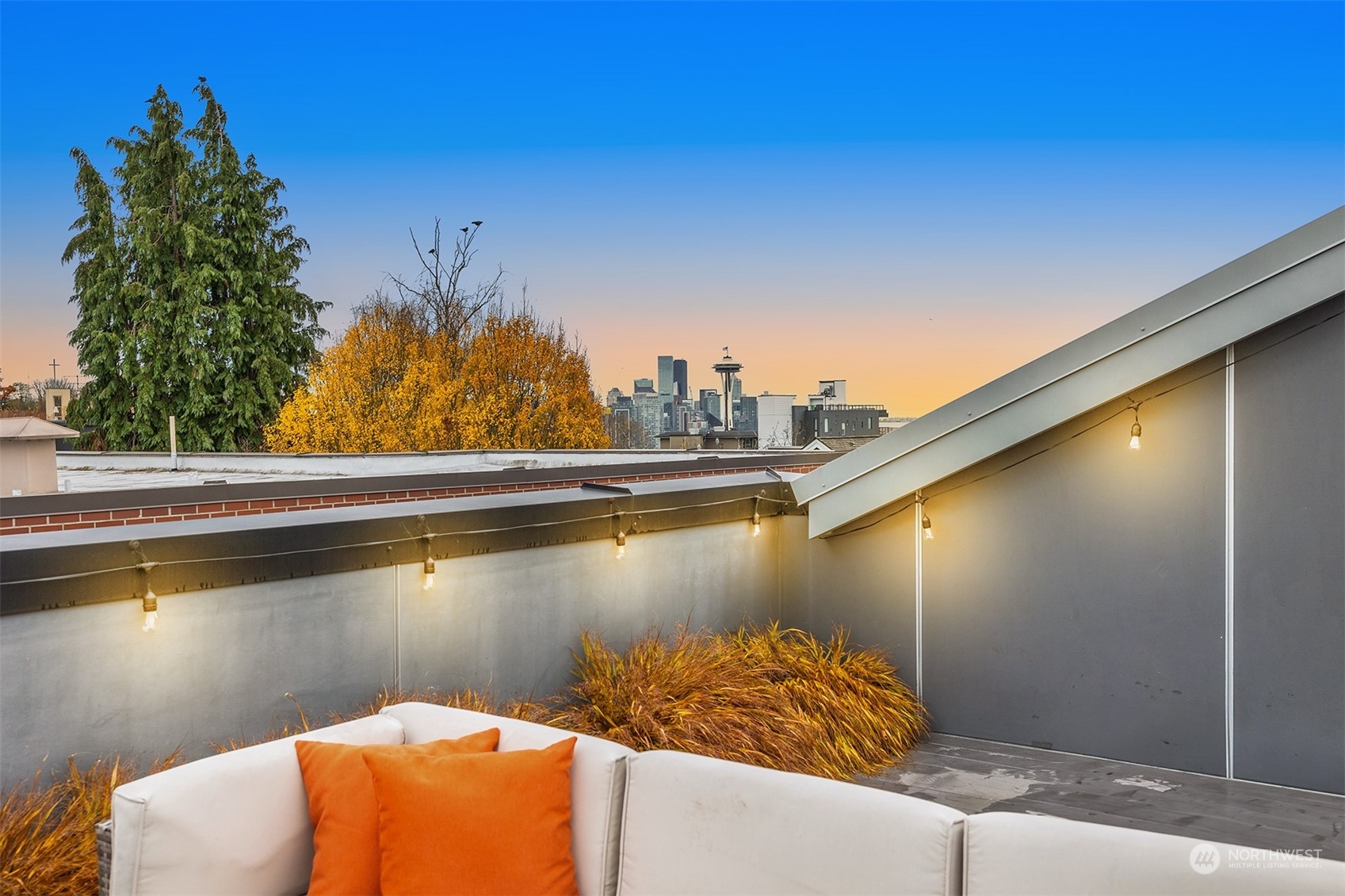 315 West Galer Street, Unit 101 Seattle, WA 98119 - Photo 28 of 37 a view of a lake from a balcony